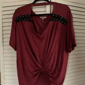 Large tie in front low V-neck front